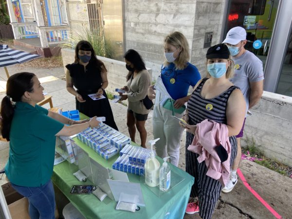 Los Angeles RV visitors sampling sun protection products