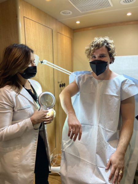 patient receiving skin cancer screening from Erum Illyas, MD