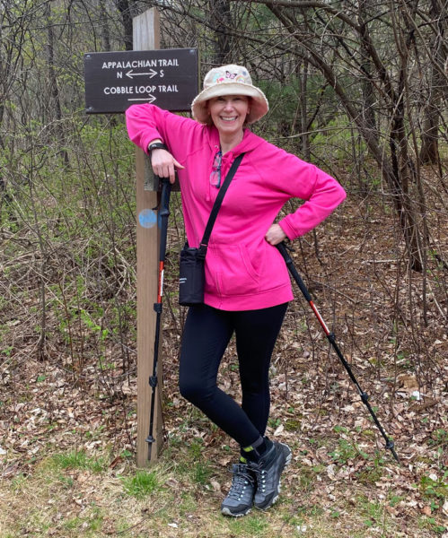 Julie hiking on trail in Tyringham, MA