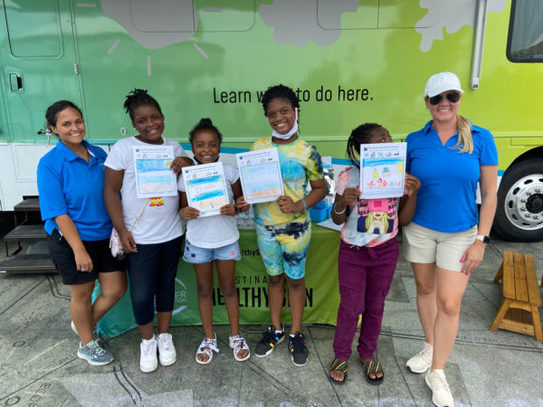 Young Detroiters showing completed sun safe artwork