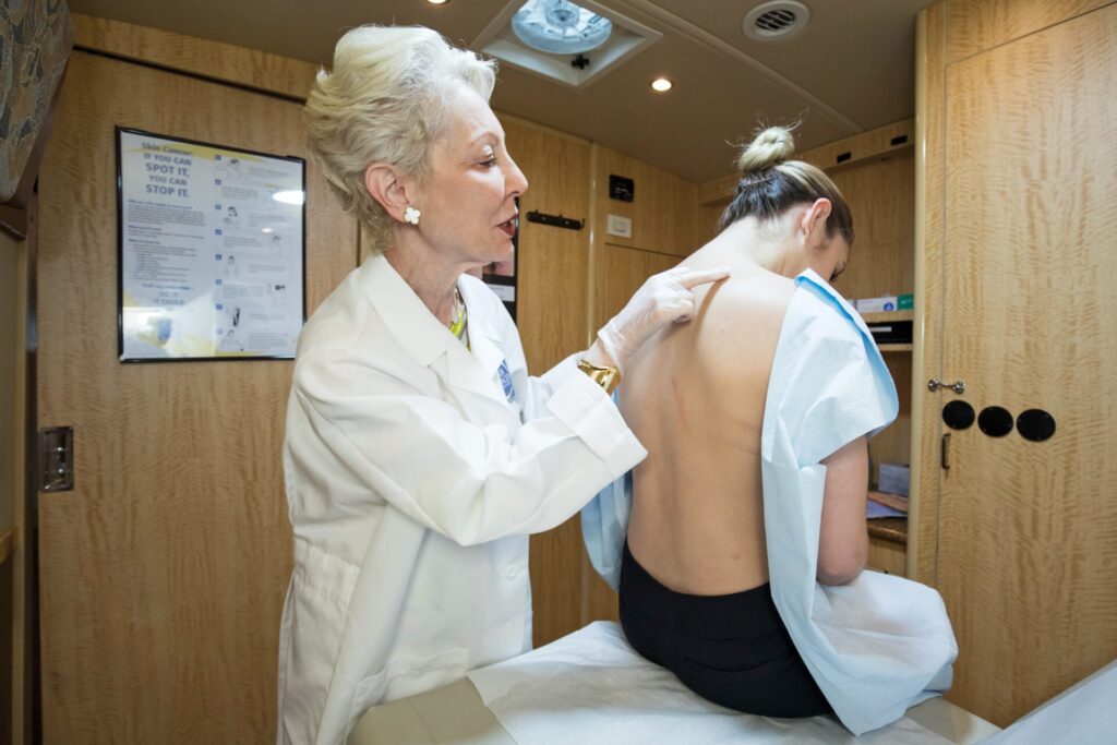 Dr Sarnoff performs a skin exam