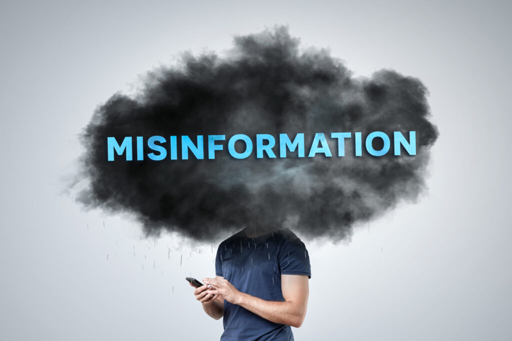 A person stands holding a smartphone, with their head obscured by a dark cloud labeled 