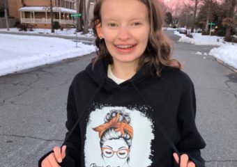 Laura Anne wearing BCC awareness sweatshirt