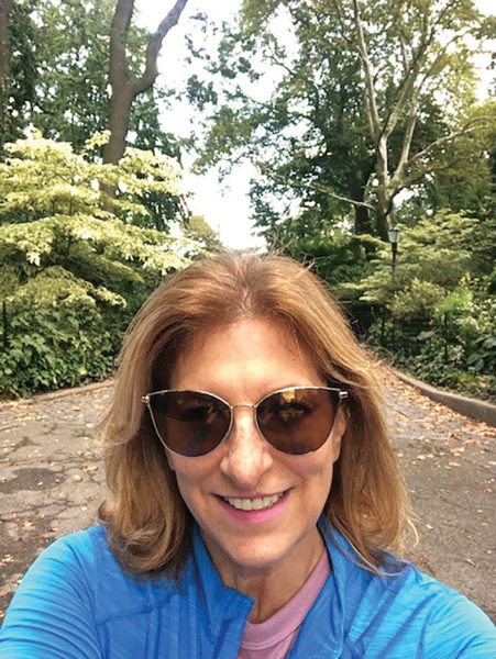 Picture of a woman wearing sunglasses. The Skin Cancer Foundation