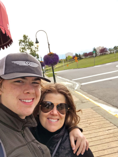 Picture of a woman and her son wearing sunglasses in Alaska 