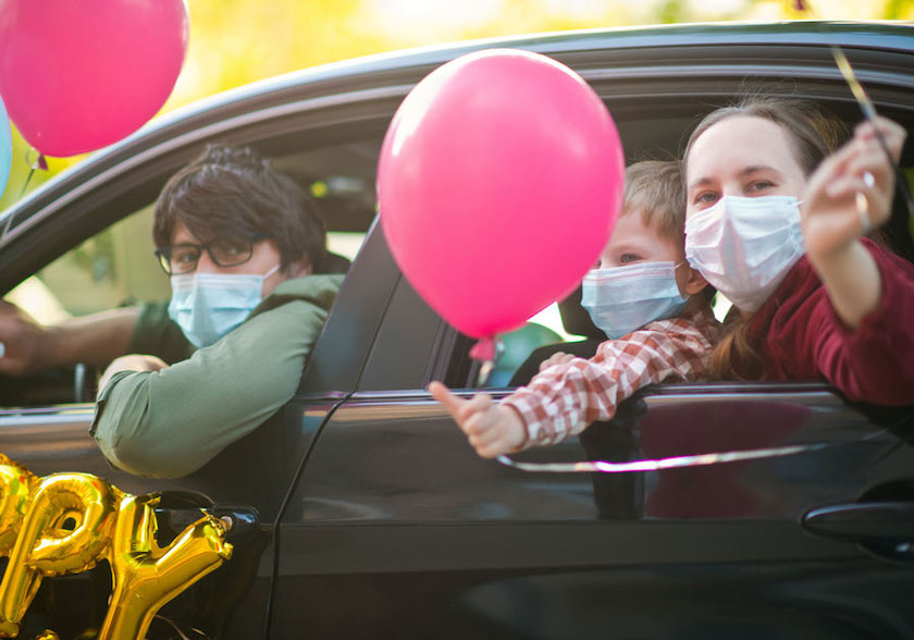 car celebration wearing face masks