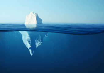 an iceberg with larger portion underwater