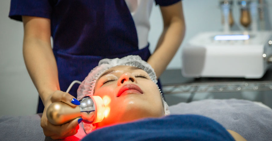 woman receiving laser treatment