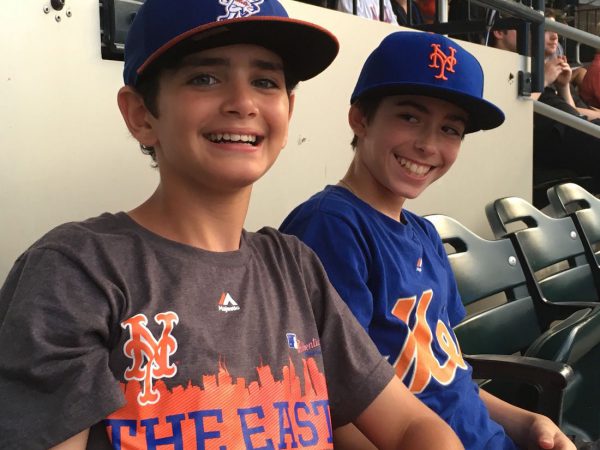 Mets fans sitting in the shade