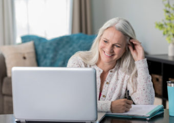 teledermatology visit on laptop