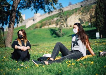 women wearing masks in park