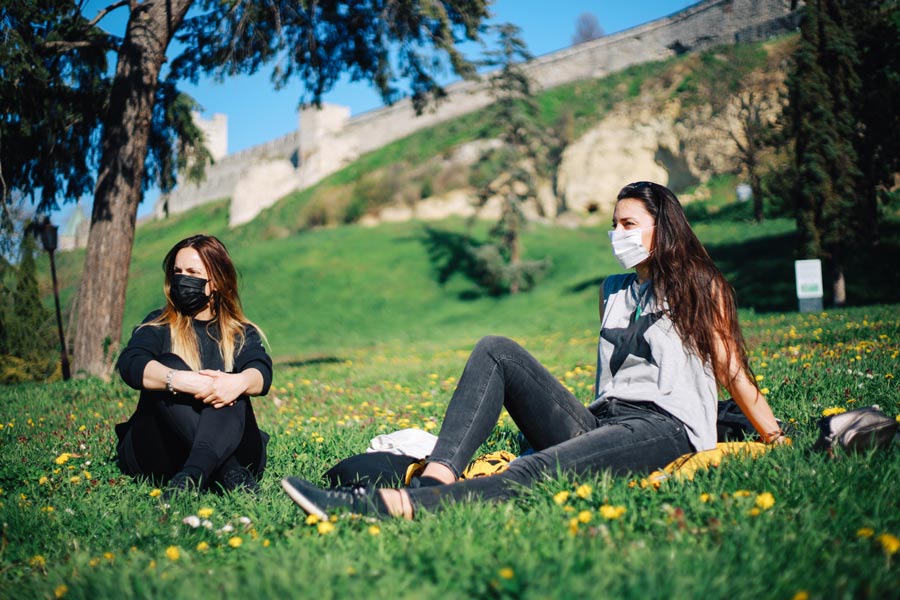 women wearing masks in park